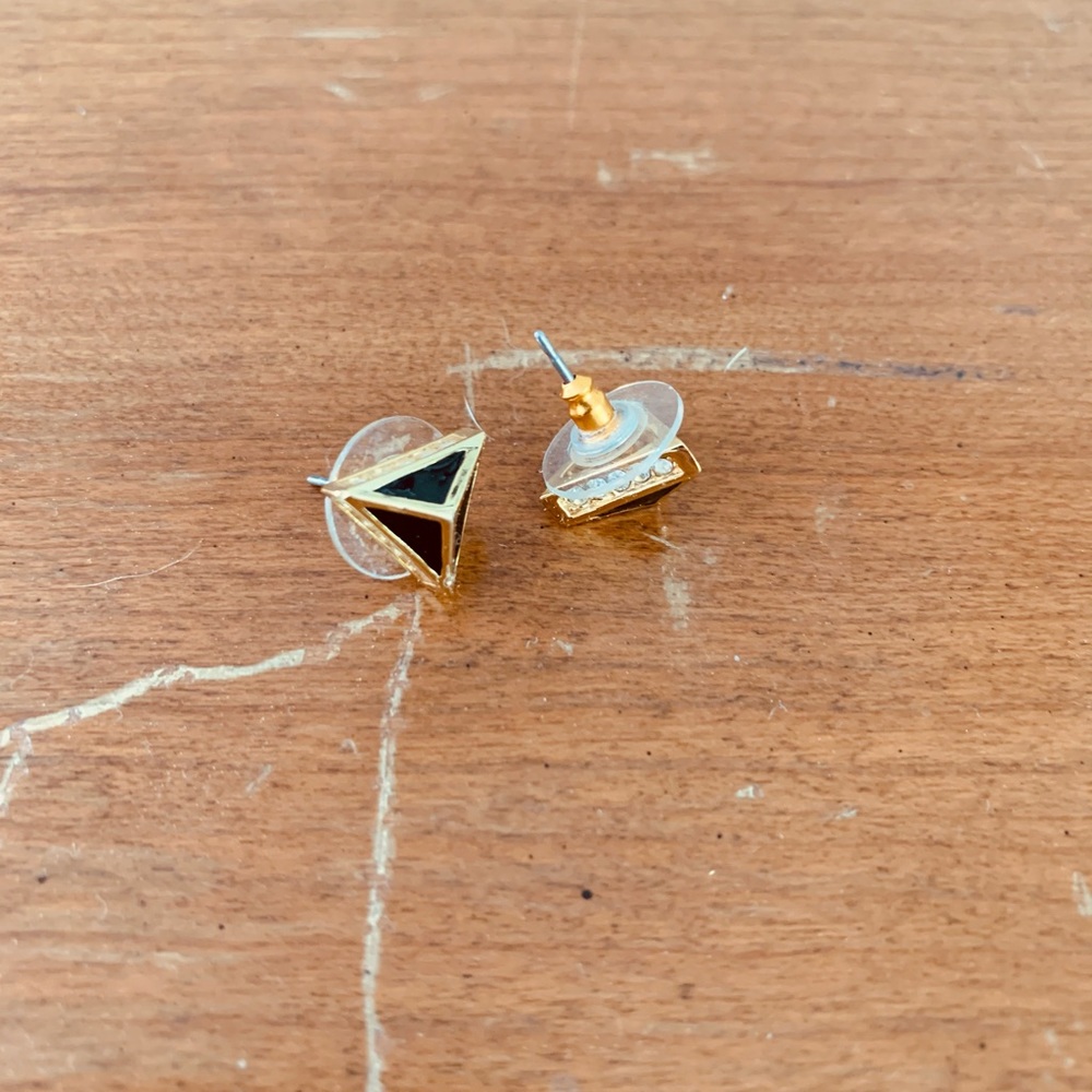 Black and gold pyramid studs with diamonds